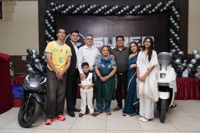 Super Motors EV launch event showcasing electric scooter in Jammu